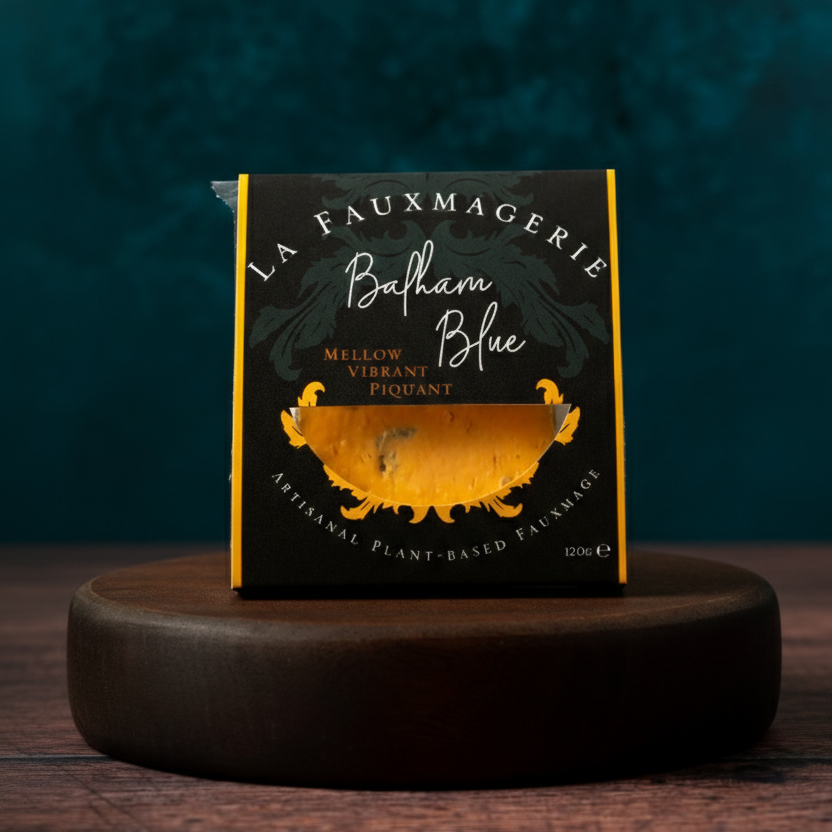 Packaged shropshire blue style cheese on plynth