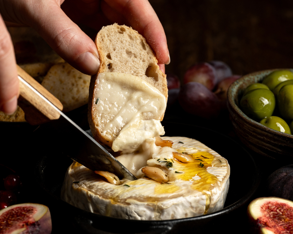Melted vegan camembert cheese